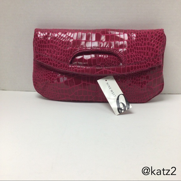 Nine West Handbags - Nine West Fuschia Reptile-look Fold Em Clutch